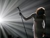 Whitney Houston bows after performing "I Didn't Know My Own Strength" at the 2009 American Music Awards in Los Angeles