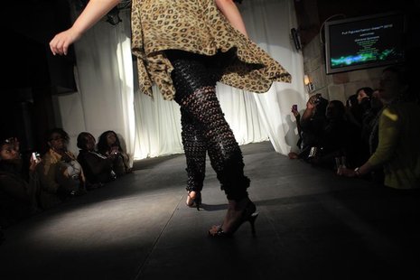 A model walks the runway during a presentation as part of Full Figure Fashion Week in New York A model walks the runway during a presentation as part of Full Figure Fashion Week in New York