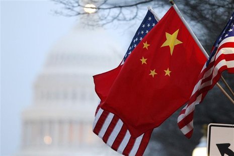 The People's Republic of China flag and the U.S. Stars and Stripes fly along Pennsylvania Avenue near the U.S. Capitol in Washington The People's Republic of China flag and the U.S. Stars and Stripes fly along Pennsylvania Avenue near the U.S. Capitol in Washington