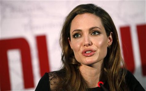 U.S. actress and director Angelina Jolie speaks during a news conference before the gala premiere of the movie "In The Land Of Blood And Hon U.S. actress and director Angelina Jolie speaks during a news conference before the gala premiere of the movie "In The Land Of Blood And Hon
