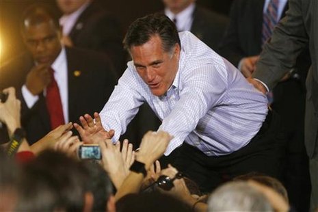 Republican presidential candidate and former Massachusetts Governor Romney greets supporters during a campaign event in Mesa, Arizona Republican presidential candidate and former Massachusetts Governor Romney greets supporters during a campaign event in Mesa, Arizona