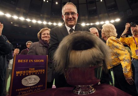 Handler David Fitzpatrick places Malachy a Pekingese into the silver bowl after he won Best In Show at the Westminster Kennel Club Dog Show Handler David Fitzpatrick places Malachy a Pekingese into the silver bowl after he won Best In Show at the Westminster Kennel Club Dog Show