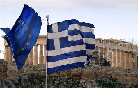 A Greek and an EU flag fly over the Greek ministry of finance in Athens A Greek and an EU flag fly over the Greek ministry of finance in Athens