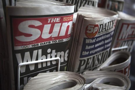 Copies of The Sun newspaper are displayed at a kiosk in London Copies of The Sun newspaper are displayed at a kiosk in London