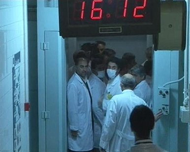 Still image taken from video shows a group of scientists seen near the control room area at the Tehran Research Reactor in Tehran Still image taken from video shows a group of scientists seen near the control room area at the Tehran Research Reactor in Tehran