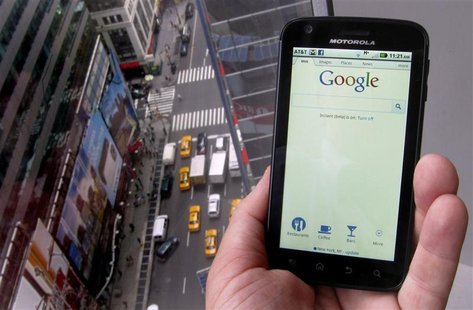 A posed picture shows a Motorola Droid phone displaying the Google search page in New York A posed picture shows a Motorola Droid phone displaying the Google search page in New York