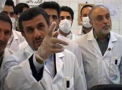 Still image taken from video shows Iran's President Ahmadinejad watching from a control room as nuclear fuel rods are loaded into the Tehran Still image taken from video shows Iran's President Ahmadinejad watching from a control room as nuclear fuel rods are loaded into the Tehran