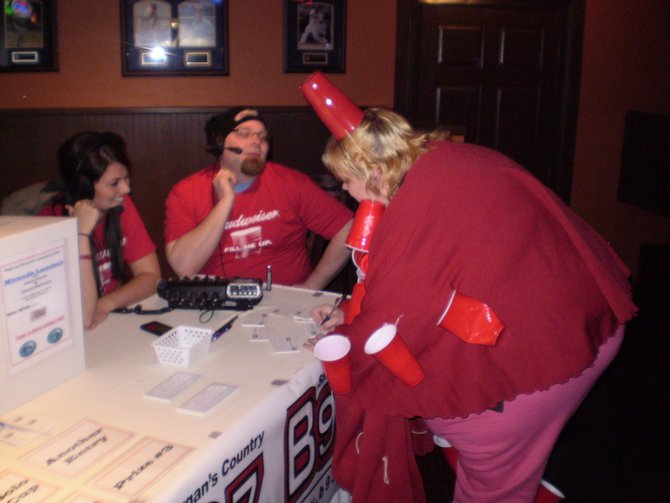 Jess Kelley and Matthew J broadcasting live from Antonio's Red Solo Cup Party