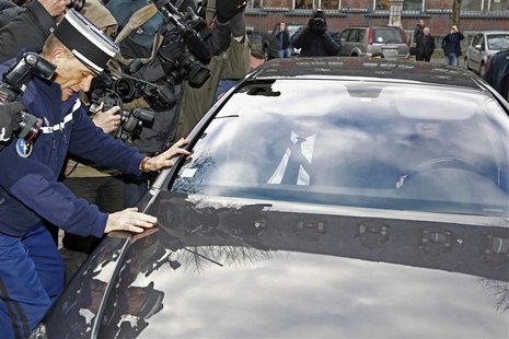 Former IMF chief Strauss-Kahn is surrounded by the media as he arrives in at the Gendarmerie in Lille Former IMF chief Strauss-Kahn is surrounded by the media as he arrives in at the Gendarmerie in Lille