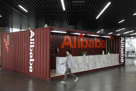 An employee walks inside the headquarters office of Alibaba (China) Technology Co. Ltd on the outskirts of Hangzhou An employee walks inside the headquarters office of Alibaba (China) Technology Co. Ltd on the outskirts of Hangzhou