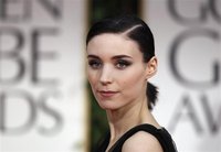 Actress Mara, from the film "The Girl with the Dragon Tattoo", arrives at the 69th annual Golden Globe Awards in Beverly Hills