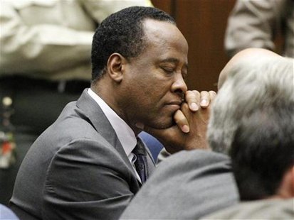 Dr. Conrad Murray closes his eyes after he was sentenced to four years in county jail for his involuntary manslaughter conviction of pop sta