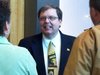 Pat Snyder (center) talks with supporters about his bid for the 85th Assembly district
