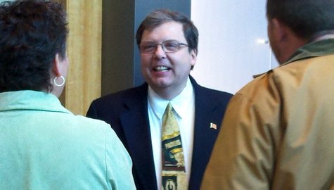 Pat Snyder (center) talks with supporters about his bid for the 85th Assembly district