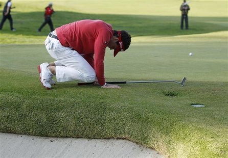 Bradley of U.S. reacts after missing a birdie putt during the Northern Trust Open golf tournament in Los Angeles