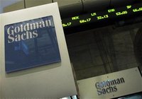 A Goldman Sachs sign is seen over their kiosk on the floor of the New York Stock Exchange