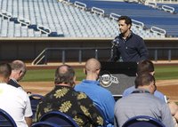 Milwaukee Brewers left fielder Ryan Braun acknowledges the media and teammates after winning an appeal of a positive drug test and 50-game s
