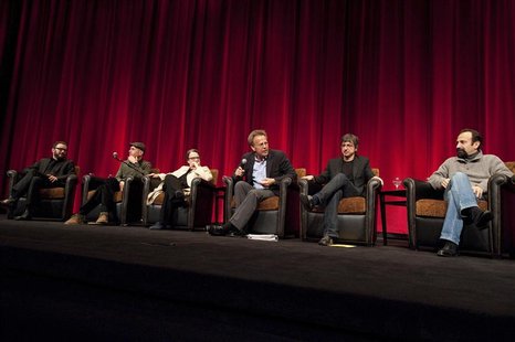 Directors and host and member of the Academy Award's Board of Governors Mark Johnson attend the Foreign Language Film symposium in Beverly H Directors and host and member of the Academy Award's Board of Governors Mark Johnson attend the Foreign Language Film symposium in Beverly H