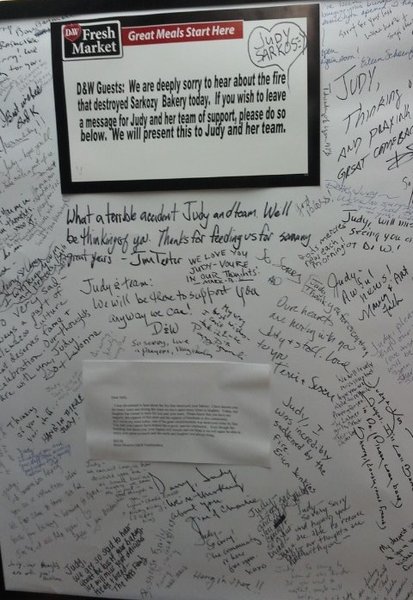 Well wishers leave notes for the Sarkozy Bakery owners.