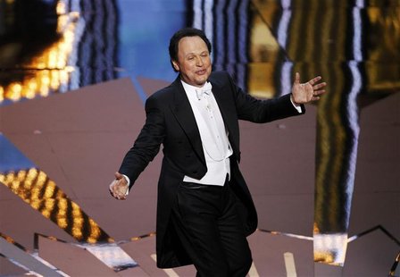 Oscar host Crystal talks on stage at the 84th Academy Awards in Hollywood, California Oscar host Crystal talks on stage at the 84th Academy Awards in Hollywood, California