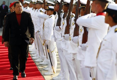 Venezuela's President Hugo Chavez is seen before boarding the plane before his departure to Cuba, in Caracas Venezuela's President Hugo Chavez is seen before boarding the plane before his departure to Cuba, in Caracas