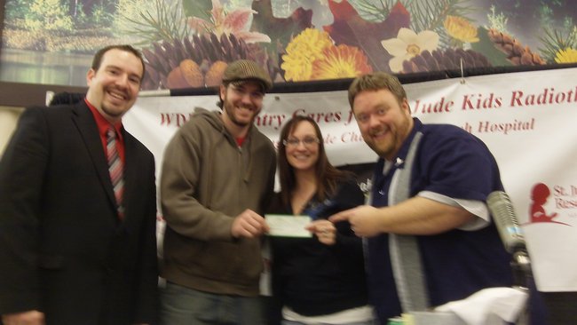 Dave and Kevin from Koo Coo's Nest Comedy Club Check presentation $3000!!