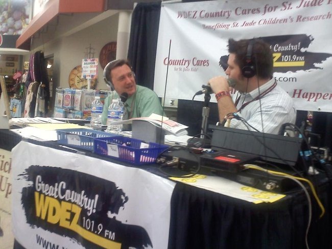 Former Morning Show cohost Lee Peek joins Greg Adams on the St. Jude Radiothon to present a check on behalf of his new employer K Tech Cleaning.