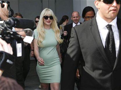 Actress Lindsay Lohan leaves court after a progress report hearing on her probation in Los Angeles, California Actress Lindsay Lohan leaves court after a progress report hearing on her probation in Los Angeles, California