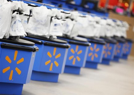 The Wal-Mart logo is pictured on cash registers at a new store in Chicago The Wal-Mart logo is pictured on cash registers at a new store in Chicago