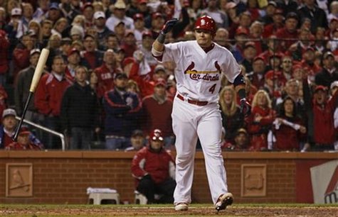 St. Louis Cardinals' Molina throws his bat after drawing a walk with the bases loaded against the Texas Rangers during the fifth inning in G St. Louis Cardinals' Molina throws his bat after drawing a walk with the bases loaded against the Texas Rangers during the fifth inning in G