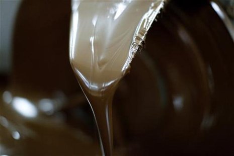 Liquid chocolate is prepared in the workshop of the "Felicitas" chocolate shop in Hornow, south of Berlin Liquid chocolate is prepared in the workshop of the "Felicitas" chocolate shop in Hornow, south of Berlin
