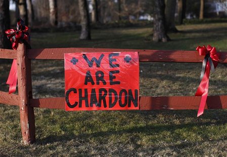 A sign remembering the victims of the Chardon High school shooting in Chardon A sign remembering the victims of the Chardon High school shooting in Chardon
