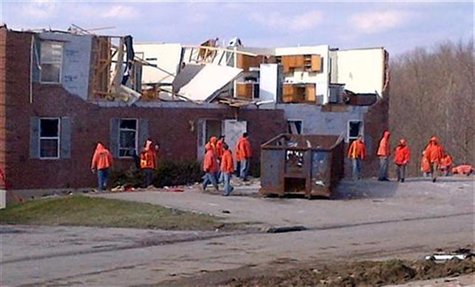 Low security inmates mingle about after a tornado damaged the Grant County correctional facility in Crittenden Low security inmates mingle about after a tornado damaged the Grant County correctional facility in Crittenden