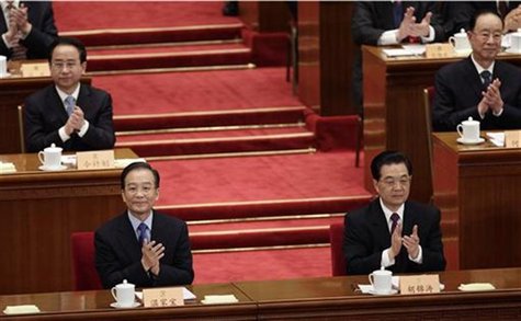China's President Hu and Premier Wen clap during the opening ceremony of the Chinese People's Political Consultative Conference in Beijing China's President Hu and Premier Wen clap during the opening ceremony of the Chinese People's Political Consultative Conference in Beijing