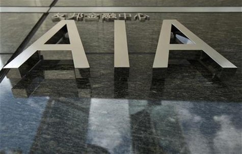 The logo of the AIA tower is seen at its entrance in Hong Kong The logo of the AIA tower is seen at its entrance in Hong Kong