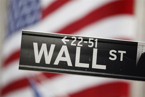 A street sign stands outside of the New York Stock Exchange A street sign stands outside of the New York Stock Exchange