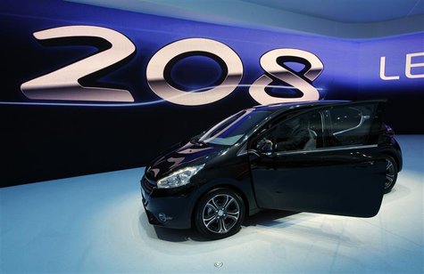 The new Peugeot 208 model car is displayed during the first media day of the Geneva Auto Show at the Palexpo in Geneva The new Peugeot 208 model car is displayed during the first media day of the Geneva Auto Show at the Palexpo in Geneva
