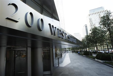 A sign shows the address of the Goldman Sachs headquarters building in New York A sign shows the address of the Goldman Sachs headquarters building in New York