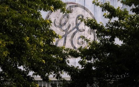 A faded, painted logo sits over the entrance to a General Electric Co. facility in Medford A faded, painted logo sits over the entrance to a General Electric Co. facility in Medford