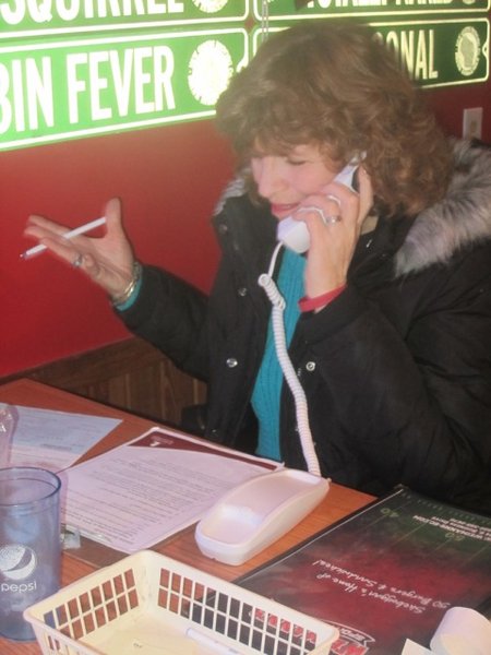Jess Kelley's mom answering phones for St Jude Radiothon
