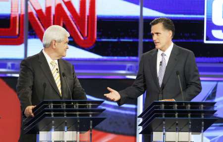 Republican presidential hopefuls (L-R) former Speaker of the U.S. House of Representatives Newt Gingrich (R-GA) and former Massachusetts Governor Mitt Romney at the first New Hampshire debate of the 2012 campaign in Manchester, New Hampshire June 13, 2011. REUTERS/Joel Page (UNITED STATES - Tags: POLITICS) Republican presidential hopefuls (L-R) former Speaker of the U.S. House of Representatives Newt Gingrich (R-GA) and former Massachusetts Governor Mitt Romney at the first New Hampshire debate of the 2012 campaign in Manchester, New Hampshire June 13, 2011. REUTERS/Joel Page (UNITED STATES - Tags: POLITICS)