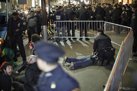 Members of the Occupy Wall St movement are arrested by NYPD officers after protesting at Zuccotti park in New York March 17, 2012.
Credit: Reuters/Eduardo Munoz Members of the Occupy Wall St movement are arrested by NYPD officers after protesting at Zuccotti park in New York March 17, 2012.
Credit: Reuters/Eduardo Munoz