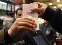 Mega-millions lottery tickets (Reuters)