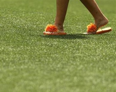 A spectator wears colorful footwear while watching a practice round for the 2006 Masters golf tournament at Augusta National Golf Club in Augusta, Georgia, April 3, 2006.
Credit: Reuters/Mike Blake A spectator wears colorful footwear while watching a practice round for the 2006 Masters golf tournament at Augusta National Golf Club in Augusta, Georgia, April 3, 2006.
Credit: Reuters/Mike Blake