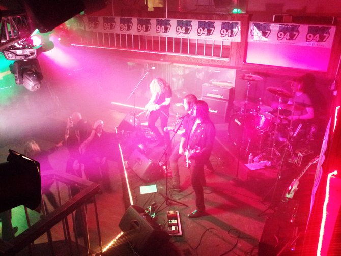 On drums, Tyler Coburn, Bass-Dean Pizzazz, Lead Vocalist-Mitch Arnold and Lead Guitar-Mitch Arnold.