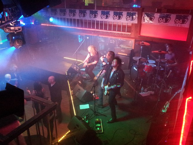 On drums, Tyler Coburn, Bass-Dean Pizzazz, Lead Vocalist-Mitch Arnold and Lead Guitar-Mitch Arnold.