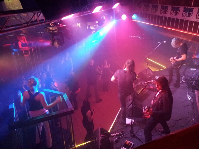 On drums, Tyler Coburn, Bass-Dean Pizzazz, Lead Vocalist-Mitch Arnold and Lead Guitar-Mitch Arnold.