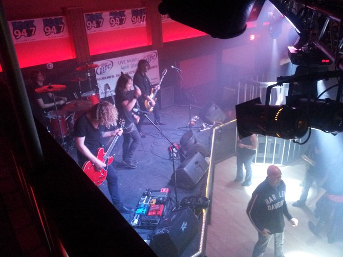 On drums, Tyler Coburn, Bass-Dean Pizzazz, Lead Vocalist-Mitch Arnold and Lead Guitar-Mitch Arnold.