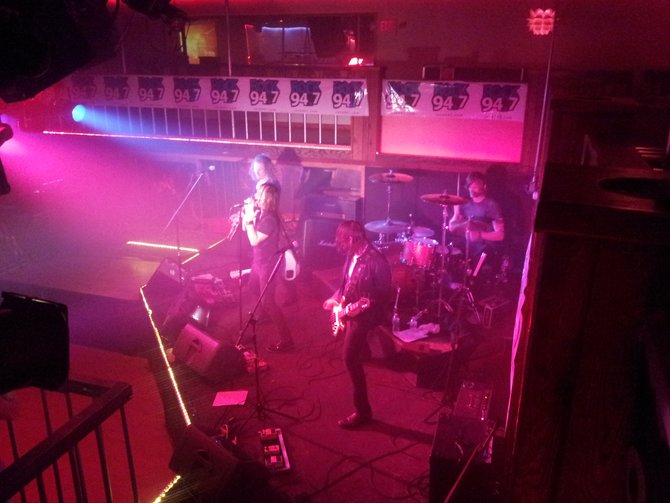 On drums, Tyler Coburn, Bass-Dean Pizzazz, Lead Vocalist-Mitch Arnold and Lead Guitar-Mitch Arnold.