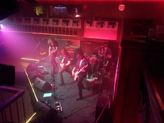 On drums, Tyler Coburn, Bass-Dean Pizzazz, Lead Vocalist-Mitch Arnold and Lead Guitar-Mitch Arnold.